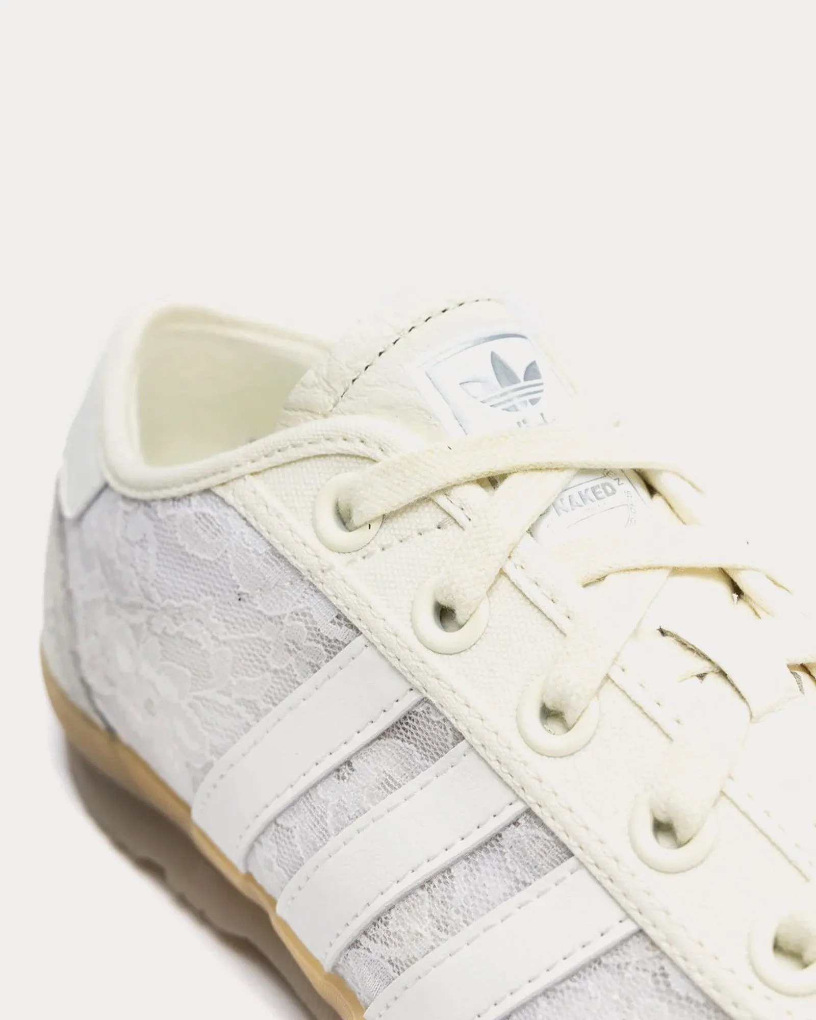 Tischtennis White / Off White / Off White / Silver Metallic Low Top Sneakers